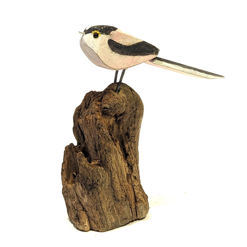 hand carved wood birds on driftwood